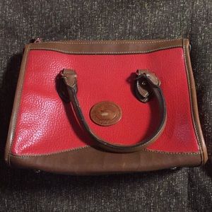 A classic Dooney Bourke red handbag